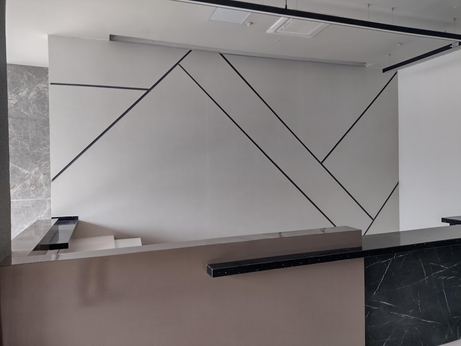 Recepción con revestimiento decorativo en PVC – Recepción CECAD